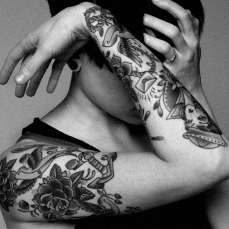 Image of girl with tattoos